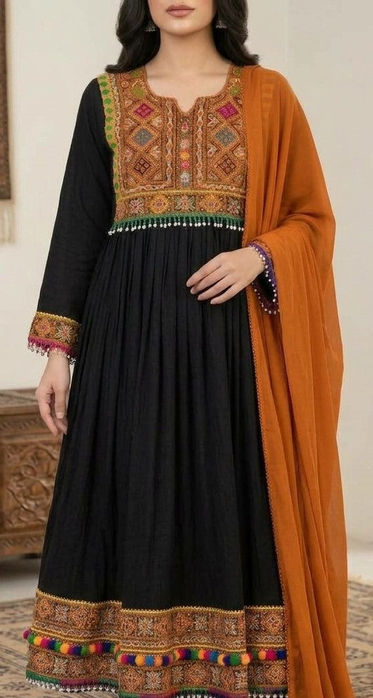 Black flared cotton dress with colorful neckline, cuff and hem detailing, paired with an orange dupatta