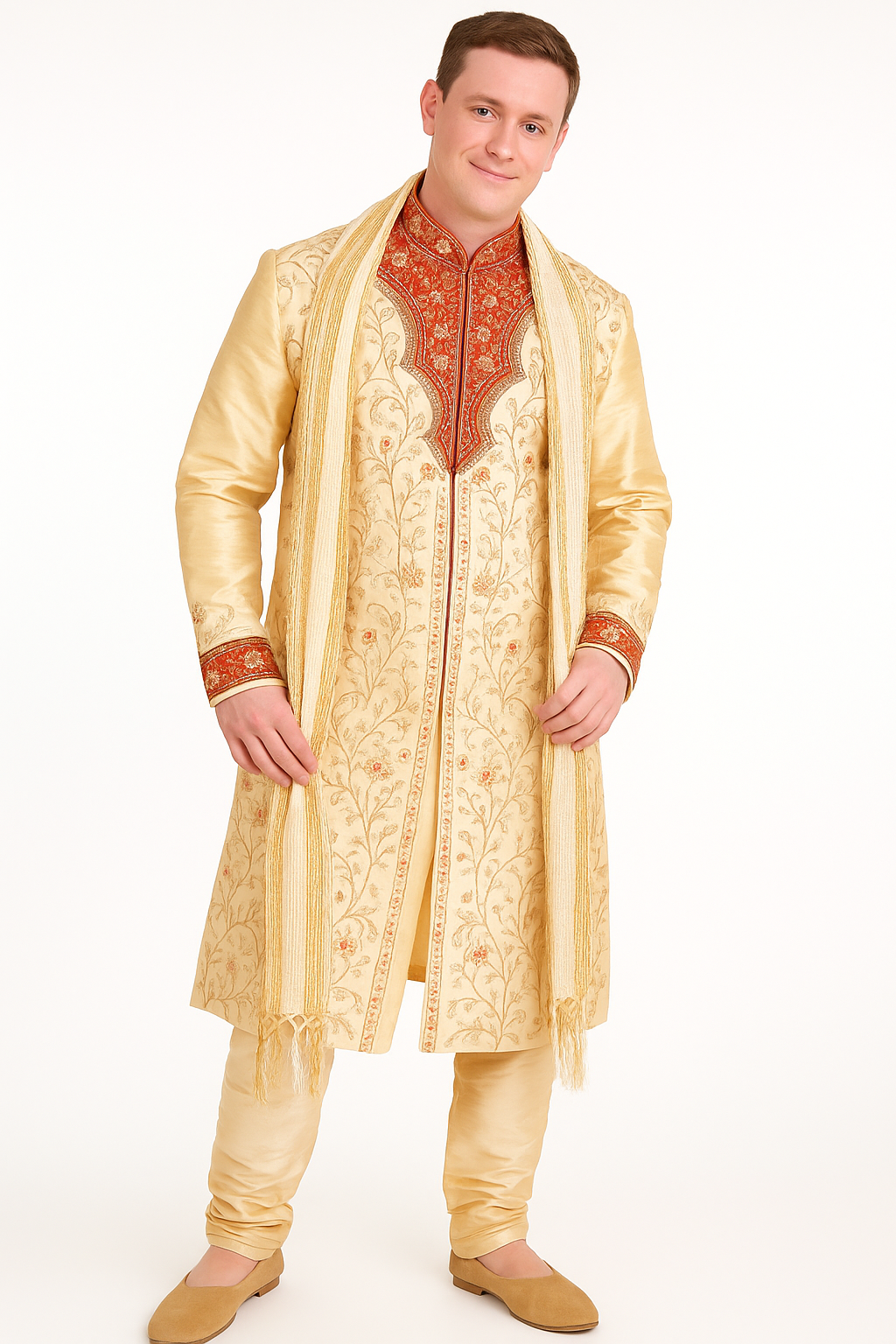 Man wearing a traditional embroidered kurta with a white background